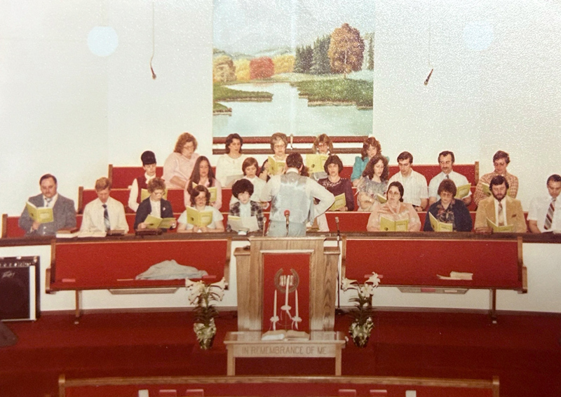 Sunday morning worship service in the sanctuary of Huber Heights Baptist Temple with choir, pulpit, and full congregation in 1978